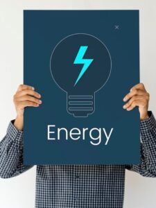 man-holding-board-with-energy-concept_53876-31206